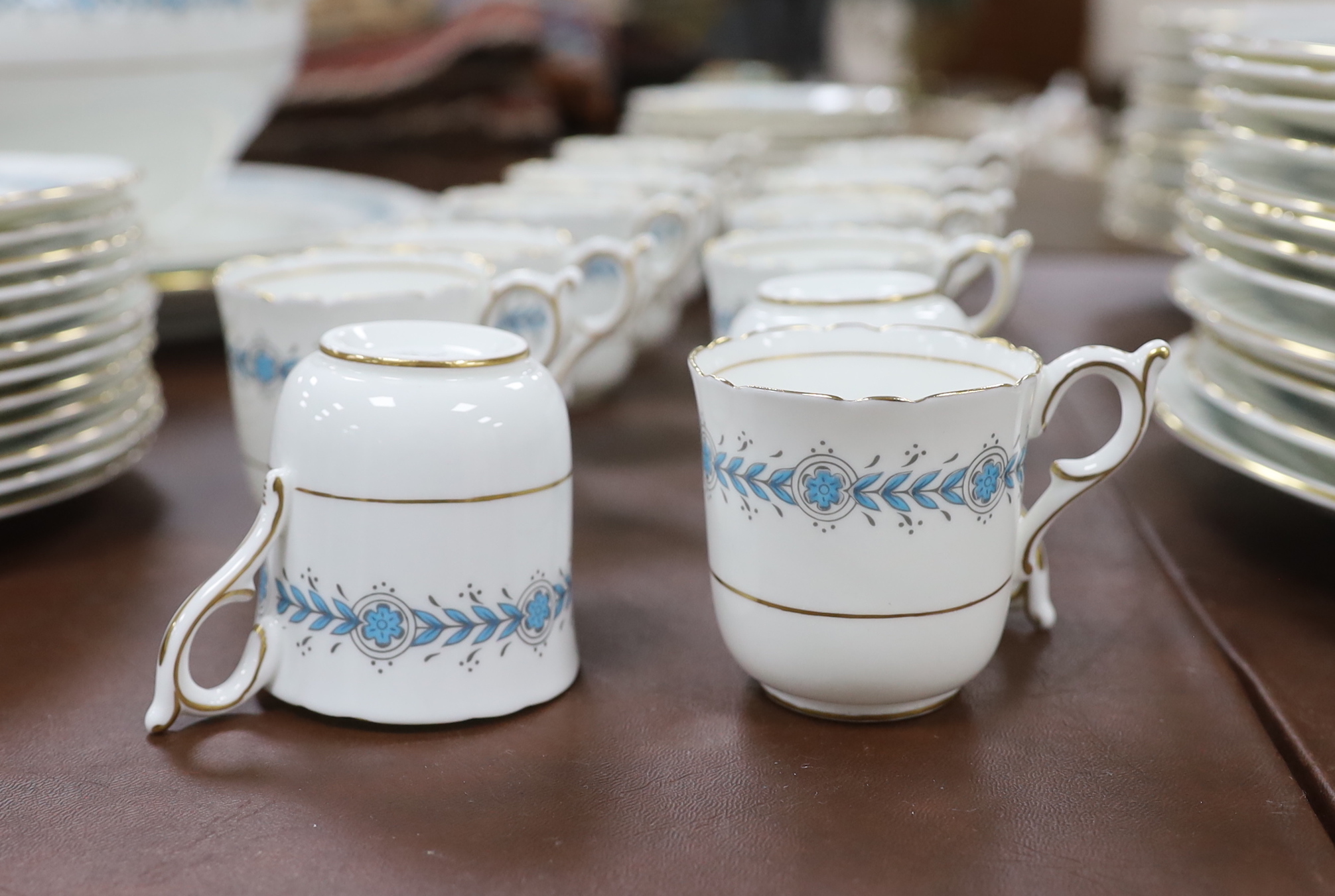 A Coalport Geneva dinner and coffee service including oval platters, bowls and tureen (a.f)